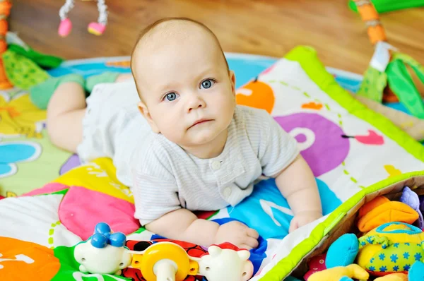 Baby on the carpet — Stock Photo, Image