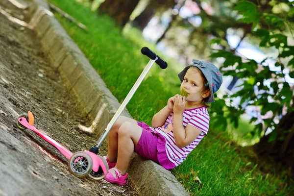 Girl with scooter — Stock Photo, Image