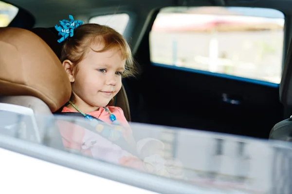 Girl in car — Stock Photo, Image