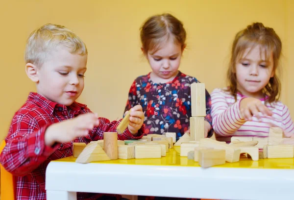 Children playing blocks — Stock Photo, Image