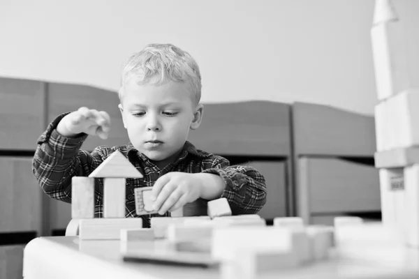 Boy playing toys — Stock Photo, Image