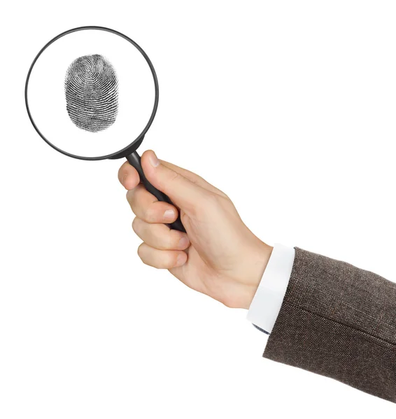 Magnifying glass in hand — Stock Photo, Image