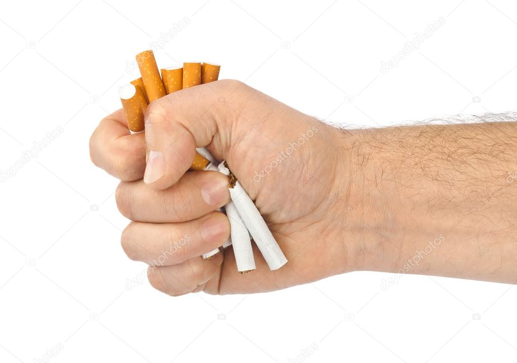 Broken cigarettes in hand