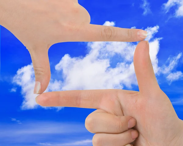 Frame made of hands and sky — Stock Photo, Image