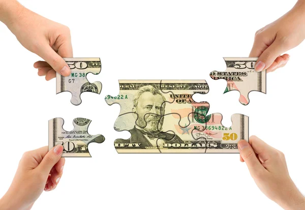 Hands and money puzzle — Stock Photo, Image