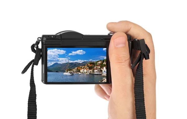 Hand with camera and Village Perast - Montenegro image (my photo — Stock Photo, Image