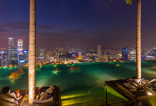 Pool on roof and Singapore city skyline