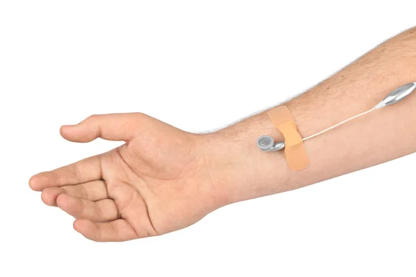 Hand with earphones like medical IV infusion — Stock Photo, Image