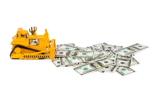 Bulldozer brinquedo e dinheiro — Fotografia de Stock