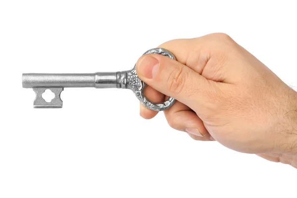 Hand with retro silver key — Stock Photo, Image