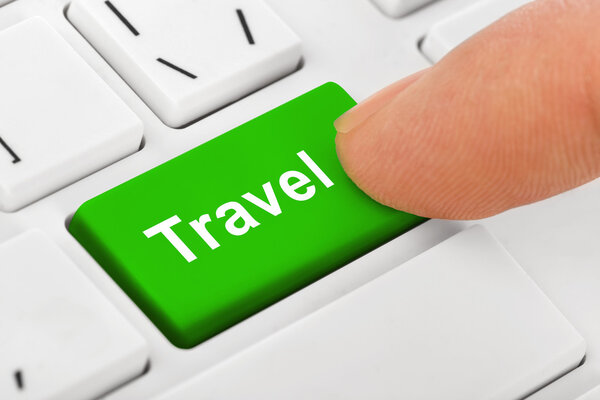 Computer keyboard with Travel key - technology background