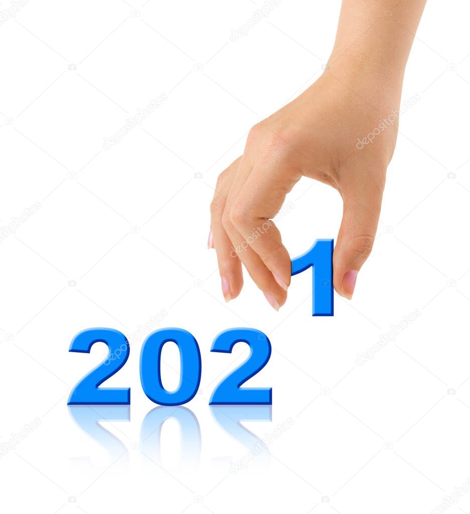 Numbers 2021 and hand isolated on white background
