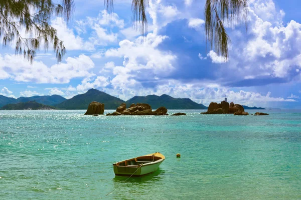 Tropical island and boat - nature background