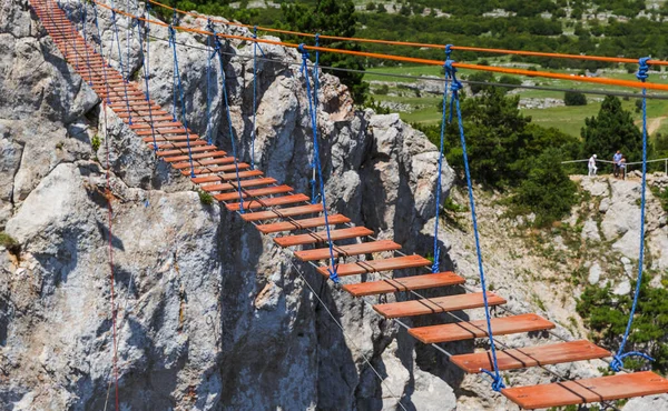 Suspension Rope Ladder Mountains Chasm Travel Background — Stock Photo, Image