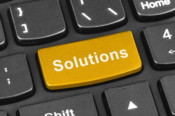 Клавиатура ноутбука с клавишей Solutions — стоковое фото