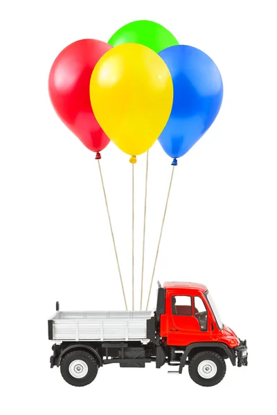 Воздушные шары и грузовик — стоковое фото