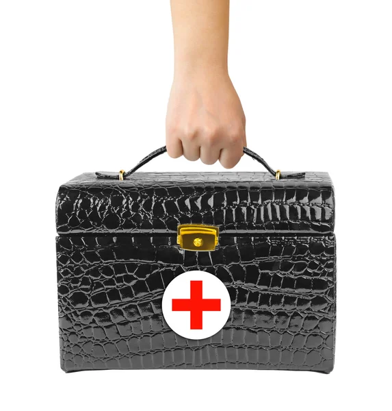 First aid bag in hand — Stock Photo, Image