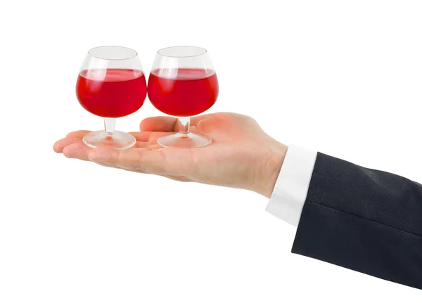 Hand and wineglasses — Stock Photo, Image