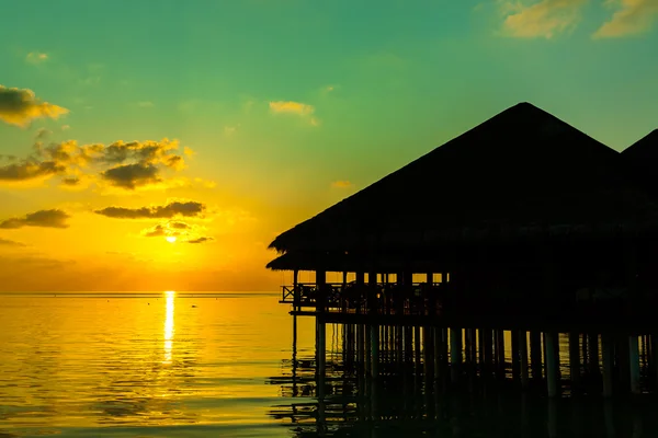 Water cafe at sunset - Maldives — Stock Photo, Image