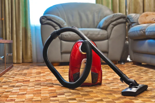 Vacuum cleaner in kamer — Stockfoto
