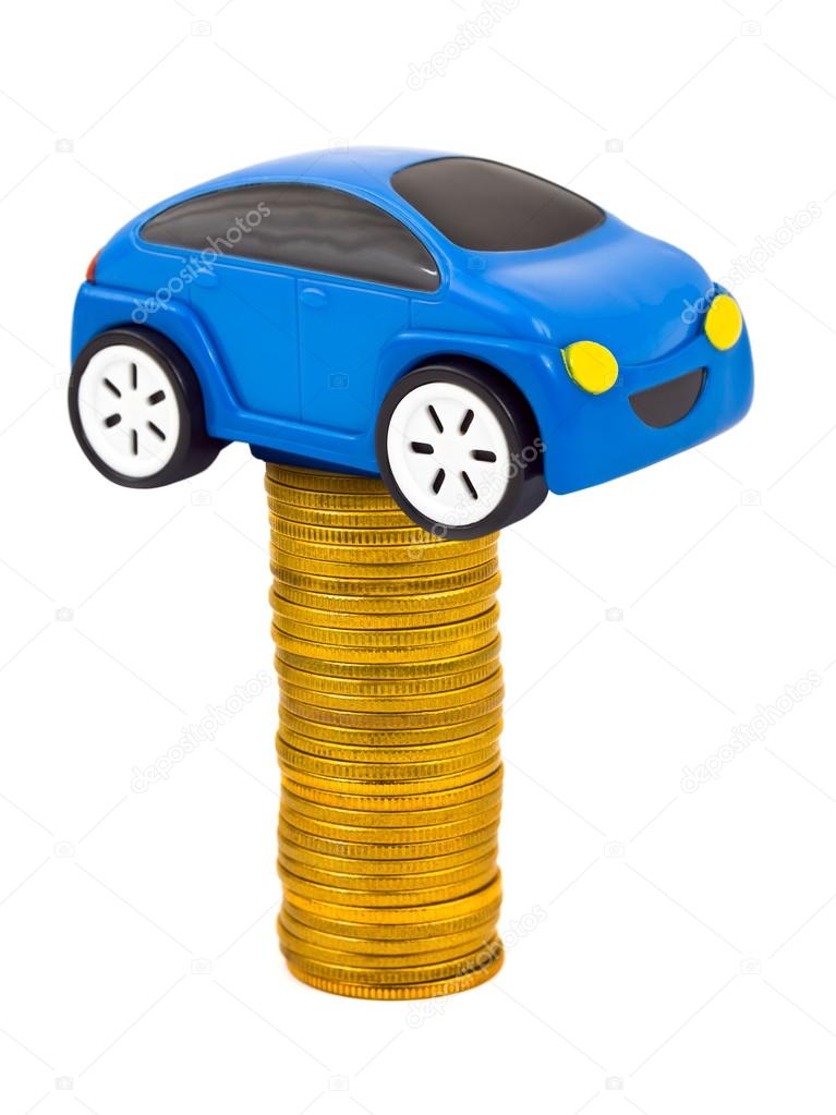 Toy car and stack of coins