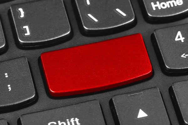 Ordenador teclado portátil con tecla roja en blanco —  Fotos de Stock