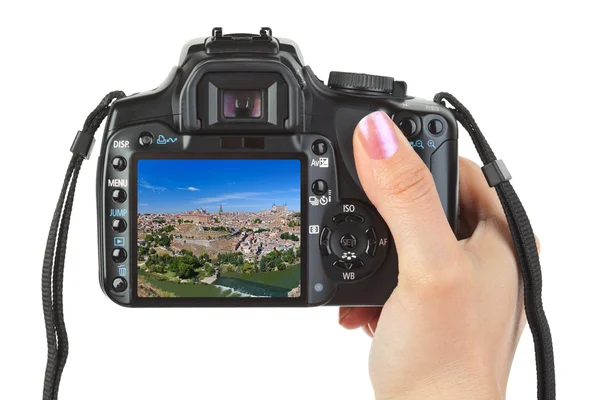 Camera in hand and Toledo Spain view (my photo) — Stock Photo, Image