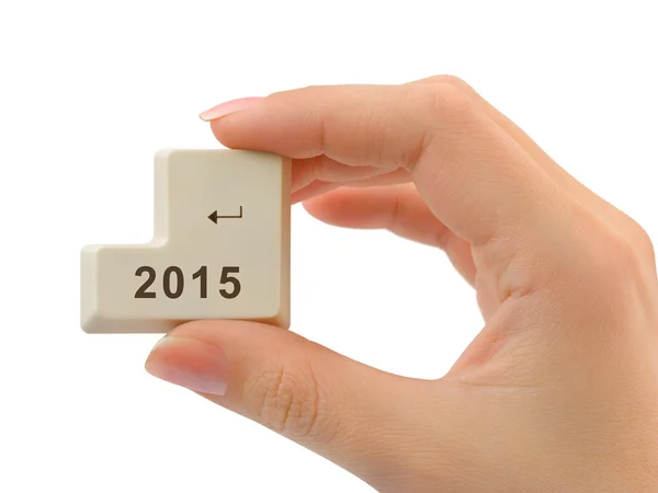Bouton d'ordinateur 2015 en main — Photo