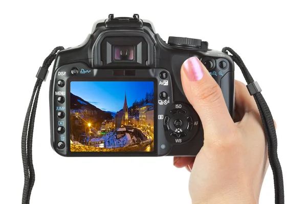 Kamera in der Hand und Winterblick auf Österreich — Stockfoto