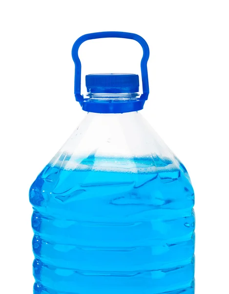 Бутылка с голубой жидкостью — стоковое фото