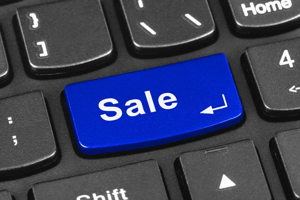 Počítač notebook klávesnice s klíčem prodej — Stock fotografie