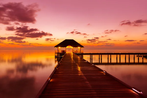 Water cafe at sunset - Maldives — Stock Photo, Image