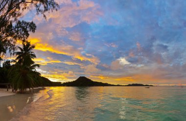 Tropical beach Cote d'Or at sunset - Seychelles clipart