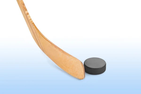 Ice hockey stick and puck — Stock Photo, Image