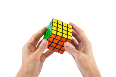 Cube puzzle in hands clipart