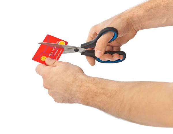 Schaar snijden oude creditcard — Stockfoto