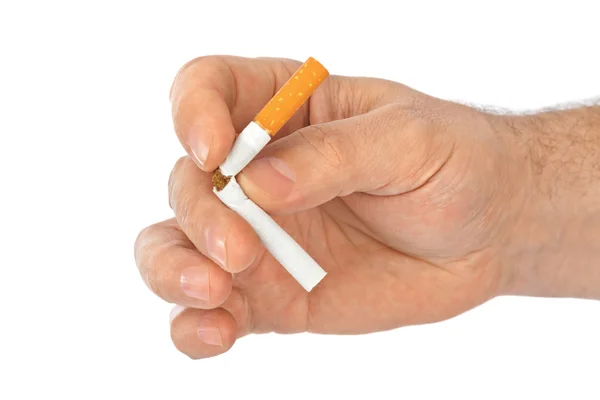 Broken cigarette in hand — Stock Photo, Image