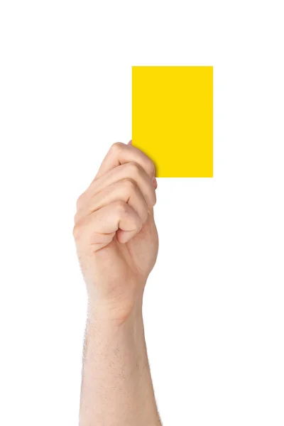 Χέρι που κρατά μια κίτρινη κάρτα — Φωτογραφία Αρχείου