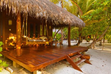 Beach bungalow - Maldives clipart