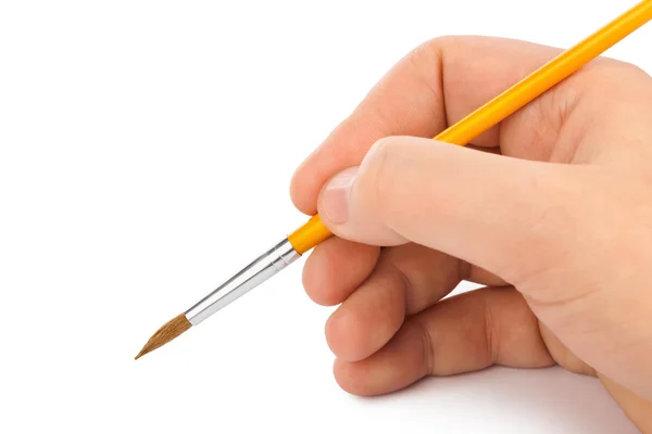 Hand med pensel — Stockfoto