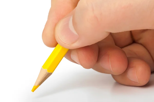 Pencil in hand Stock Image