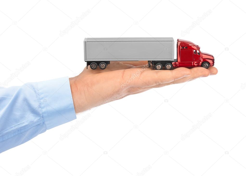 Toy car truck in hand