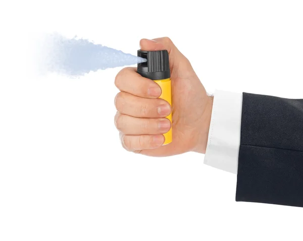 Hand met fles pepperspray — Stockfoto