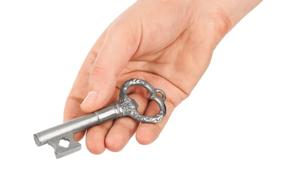 Hand with retro silver key — Stock Photo, Image