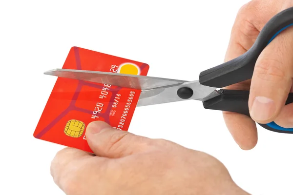 Scissors cutting old credit card — Stock Photo, Image