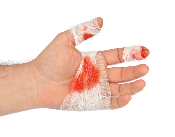 Hand med blod och bandage — Stockfoto