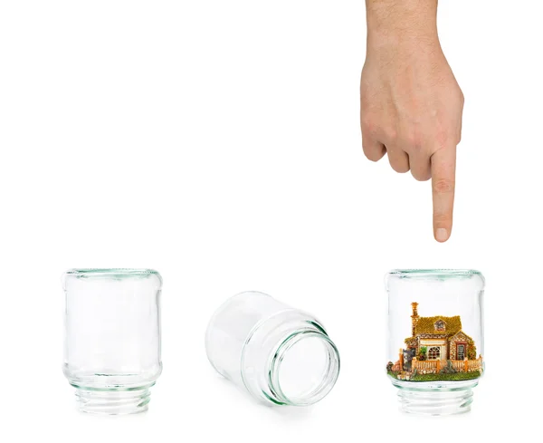 House and shell game with glass jars — Stock Photo, Image