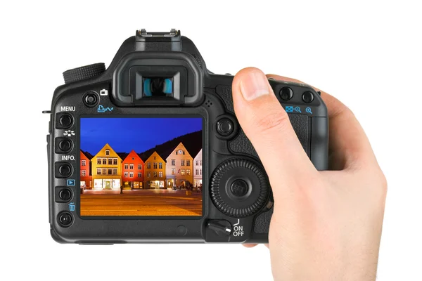 Hand met camera en Noorwegen reizen foto — Stockfoto