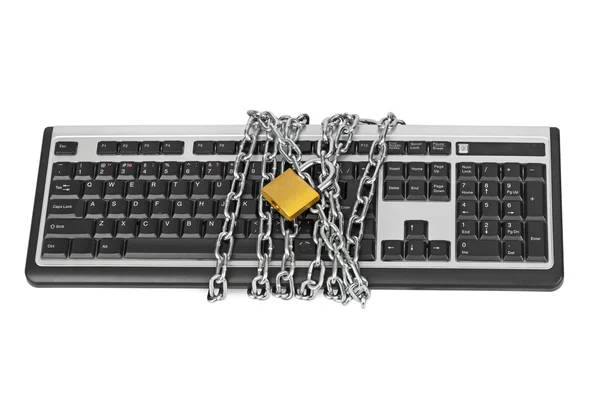 Computer keyboard and chains — Stock Photo, Image