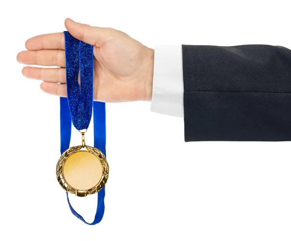 Gold medal in hand — Stock Photo, Image